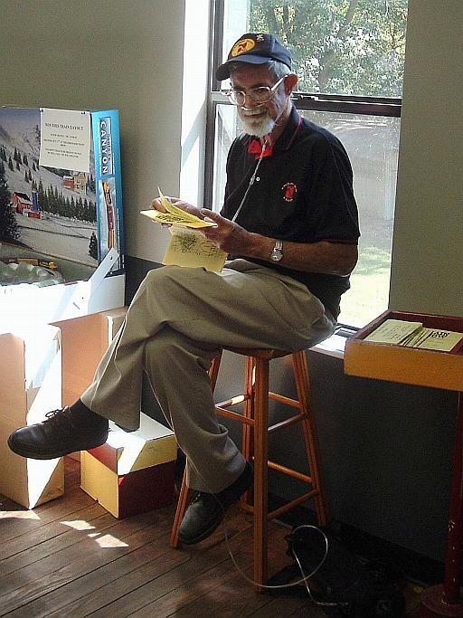 Image - Larry Rude hands out show flyers.jpg